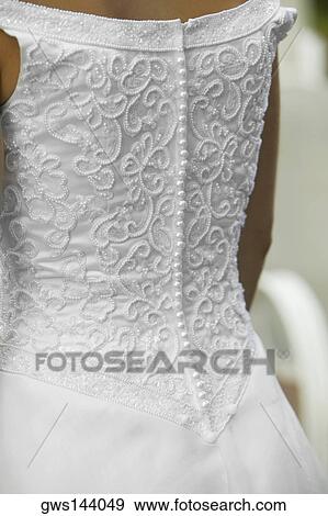 Mid section view of a bride View Large Photo Image Stock Photo - Mid section view of a bride. Fotosearch