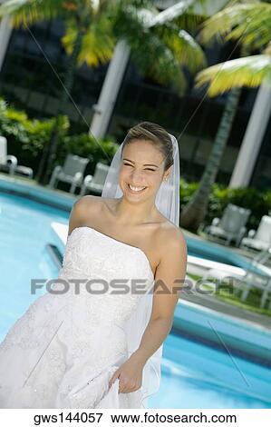 Stock Photo - Portrait of a bride smiling. Fotosearch