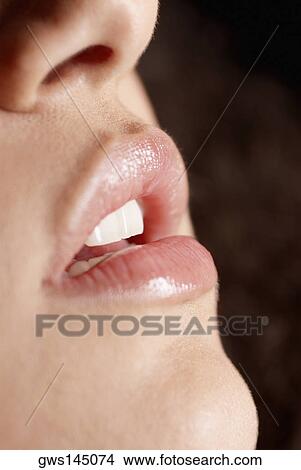 Close-up of a young woman's lips View Large Photo Image Picture - Close-up of a young woman's lips. Fotosearch