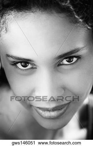 Portrait of a young woman smiling View Large Photo Image Stock Image - Portrait of a young woman smiling. Fotosearch