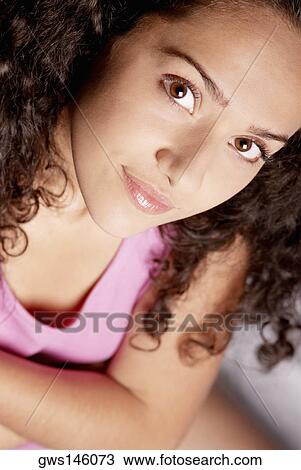 Portrait of a young woman View Large Photo Image Stock Image - Portrait of a young woman. Fotosearch