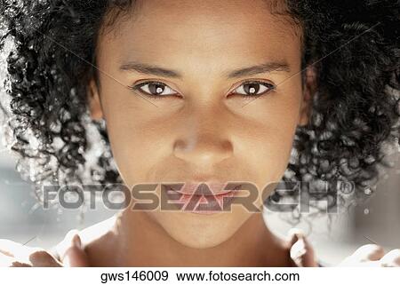 Portrait of a young woman View Large Photo Image Stock Photo - Portrait of a young woman. Fotosearch