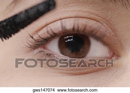 Close-up of a young woman's eye View Large Photo Image Picture - Close-up of a young woman's eye. Fotosearch