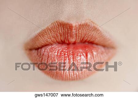 Close-up of a young woman's lips View Large Photo Image Stock Photo - Close-up of a young woman's lips. Fotosearch