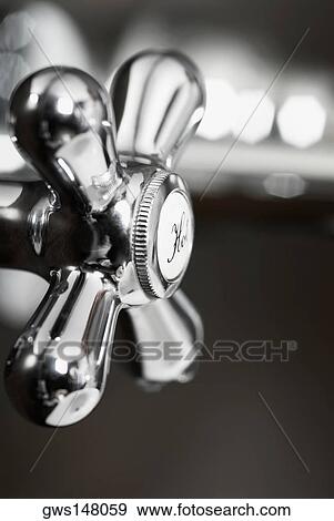 Close-up of a faucet View Large Photo Image Stock Photo - Close-up of a faucet. Fotosearch