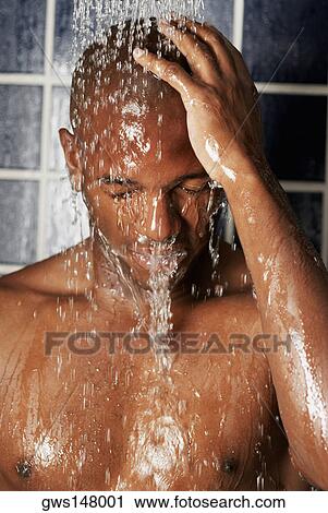 Close-up of a young man in the shower View Large Photo Image Stock Image - Close-up of a young man in the shower. Fotosearch