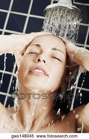 Close-up of a young woman in the shower View Large Photo Image Stock Photography - Close-up of a young woman in the shower. Fotosearch