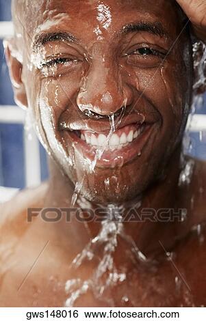 Portrait of a young man taking a bath View Large Photo Image Stock Photograph - Portrait of a young man taking a bath. Fotosearch