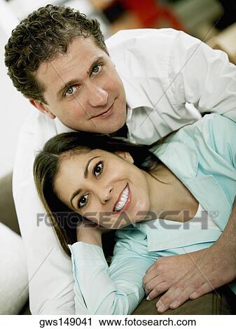 Portrait of a mid adult couple smiling View Large Photo Image Stock Image - Portrait of a mid adult couple smiling. Fotosearch
