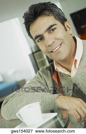 Portrait of a mature man smiling View Large Photo Image Stock Photo - Portrait of a mature man smiling. Fotosearch