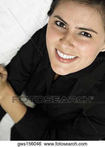 Stock Photograph - Portrait of a businesswoman smiling. Fotosearch
