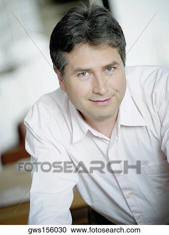 Stock Image - Portrait of a mature man smiling. Fotosearch