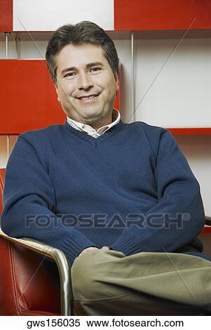 Portrait of a mature man smiling View Large Photo Image Stock Photography - Portrait of a mature man smiling. Fotosearch