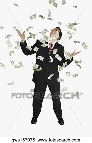 American dollar bills raining down on a businessman View Large Photo Image Stock Photography - American dollar bills raining down on a businessman. Fotosearch