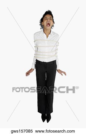 Businesswoman tied up with a rope and screaming View Large Photo Image Stock Photography - Businesswoman tied up with a rope and screaming. Fotosearch