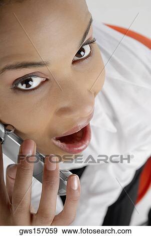 Portrait of a businesswoman talking on a mobile phone View Large Photo Image Stock Photo - Portrait of a businesswoman talking on a mobile phone. Fotosearch