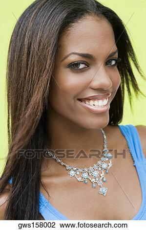 Portrait of a teenage girl smiling View Large Photo Image Stock Image - Portrait of a teenage girl smiling. Fotosearch
