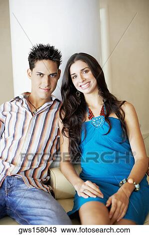 Portrait of a young couple smiling View Large Photo Image Stock Image - Portrait of a young couple smiling. Fotosearch