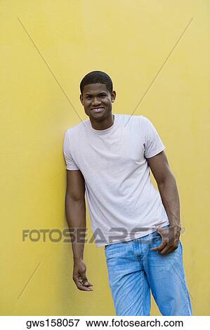 Stock Photo - Portrait of a young man smiling. Fotosearch
