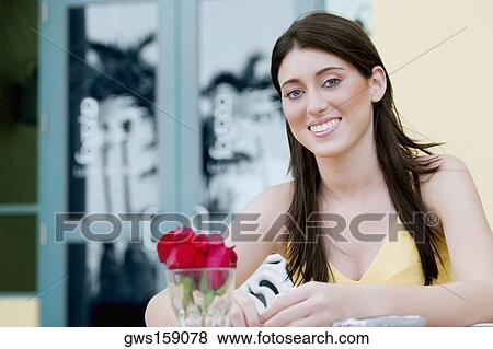 Stock Photo - Portrait of a teenage girl smiling. Fotosearch