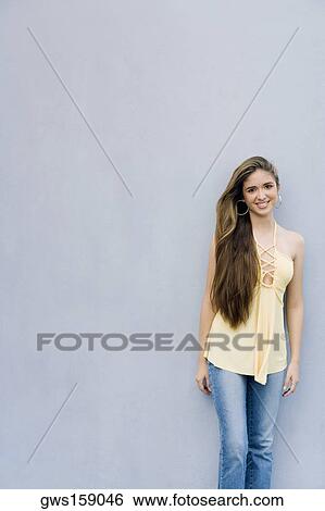 Stock Photograph - Portrait of a teenage girl smiling. Fotosearch