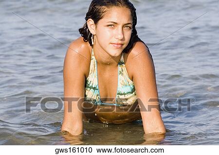 Portrait of a teenage girl in the sea View Large Photo Image Stock Image - Portrait of a teenage girl in the sea. Fotosearch