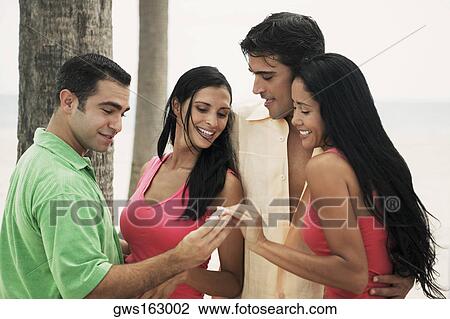 Close-up of a group of people smiling View Large Photo Image Stock Image - Close-up of a group of people smiling. Fotosearch