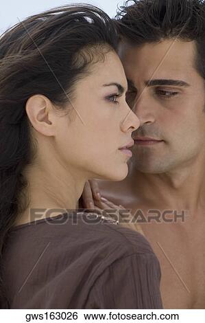 Close-up of a young couple View Large Photo Image Stock Photograph - Close-up of a young couple. Fotosearch