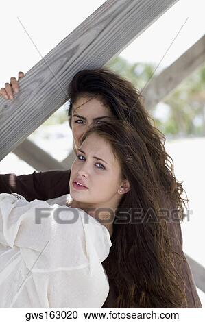 Portrait of two young women View Large Photo Image Stock Image - Portrait of two young women. Fotosearch