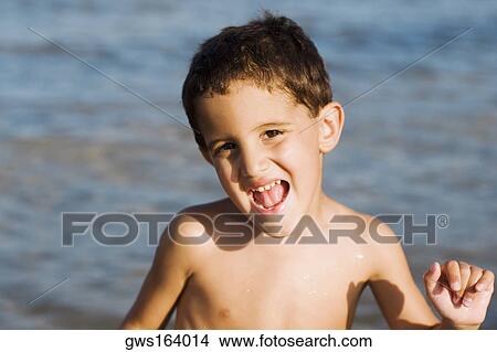 Portrait of a boy laughing View Large Photo Image Picture - Portrait of a boy laughing. Fotosearch