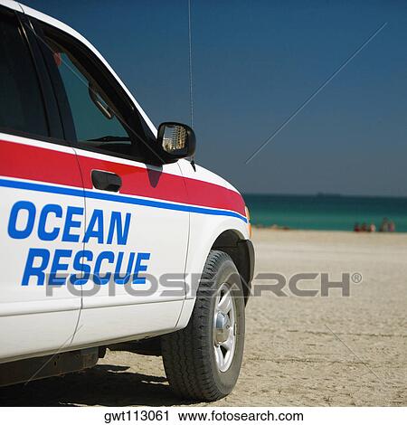 Stock Image - Car on the beach. Fotosearch