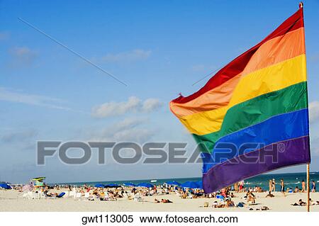 Close-up of a flag fluttering on the beach View Large Photo Image Stock Photography - Close-up of a flag fluttering on the beach. Fotosearch