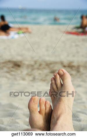 Stock Photo - Close-up of a person's legs. Fotosearch