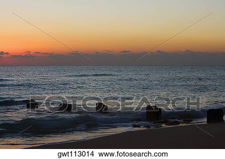 Panoramic view of the sea at dusk View Large Photo Image Picture - Panoramic view of the sea at dusk. Fotosearch