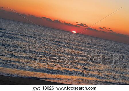 Sunset over the sea, Miami, Florida, USA View Large Photo Image Stock Photograph - Sunset over the sea, Miami, Florida, USA. Fotosearch
