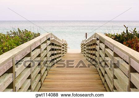 Empty boardwalk on the beach View Large Photo Image Stock Photo - Empty boardwalk on the beach. Fotosearch