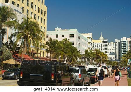 Group of people walking on the sidewalk, Miami, Florida, USA View Large Photo Image Picture - Group of people walking on the sidewalk, Miami, Florida, USA. Fotosearch