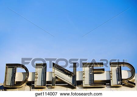 Low angle view of a commercial sign View Large Photo Image Stock Photo - Low angle view of a commercial sign. Fotosearch