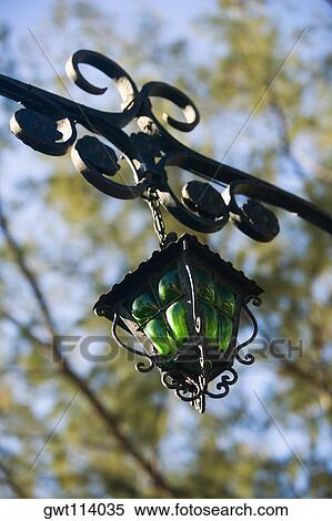 Low angle view of a lantern hanging View Large Photo Image Stock Photography - Low angle view of a lantern hanging. Fotosearch