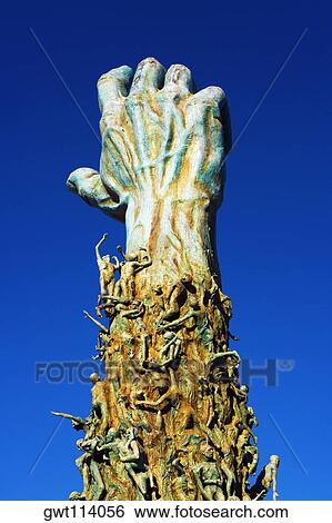 Low angle view of a sculptured human hand View Large Photo Image Stock Photograph - Low angle view of a sculptured human hand. Fotosearch