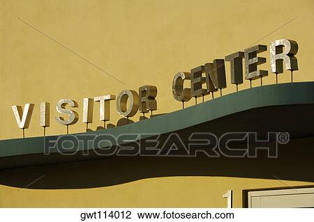 Stock Image - Low angle view of text on the wall. Fotosearch