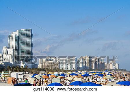 Tourists on the beach, Miami, Florida, USA View Large Photo Image Stock Photo - Tourists on the beach, Miami, Florida, USA. Fotosearch
