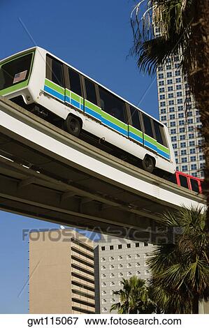 Low angle view of a bus moving on an overpass, Miami, Florida, USA View Large Photo Image Stock Photo - Low angle view of a bus moving on an overpass, Miami, Florida, USA. Fotosearch