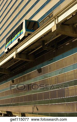 Low angle view of a bus moving on an overpass, Miami, Florida, USA View Large Photo Image Stock Photo - Low angle view of a bus moving on an overpass, Miami, Florida, USA. Fotosearch