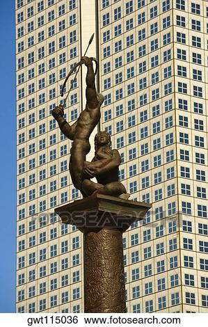 Stock Photograph - Low angle view of a statue in front of a building, Miami, Florida, USA. Fotosearch