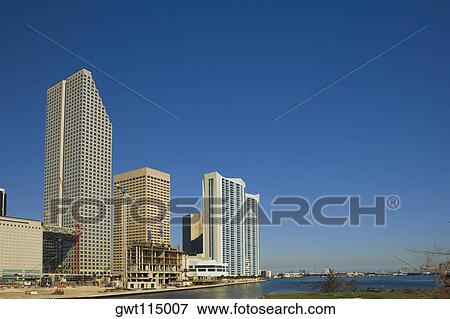 Low angle view of buildings at the waterfront, Miami, Florida, USA View Large Photo Image Stock Photo - Low angle view of buildings at the waterfront, Miami, Florida, USA. Fotosearch