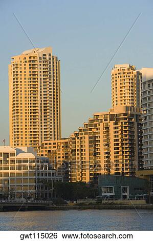 Low angle view of skyscrapers at the waterfront, Miami, Florida, USA View Large Photo Image Stock Photograph - Low angle view of skyscrapers at the waterfront, Miami, Florida, USA. Fotosearch
