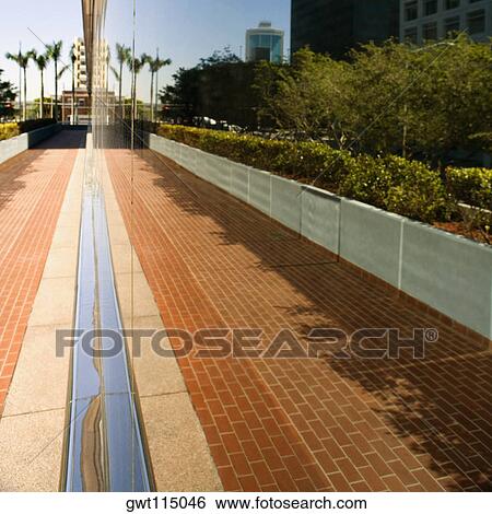 Stock Photograph - Reflection of a building on glass, Miami, Florida, USA. Fotosearch