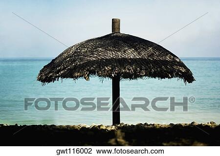 Stock Image - Close-up of a beach umbrella. Fotosearch