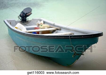 Close-up of a motorboat on the beach View Large Photo Image Stock Image - Close-up of a motorboat on the beach. Fotosearch